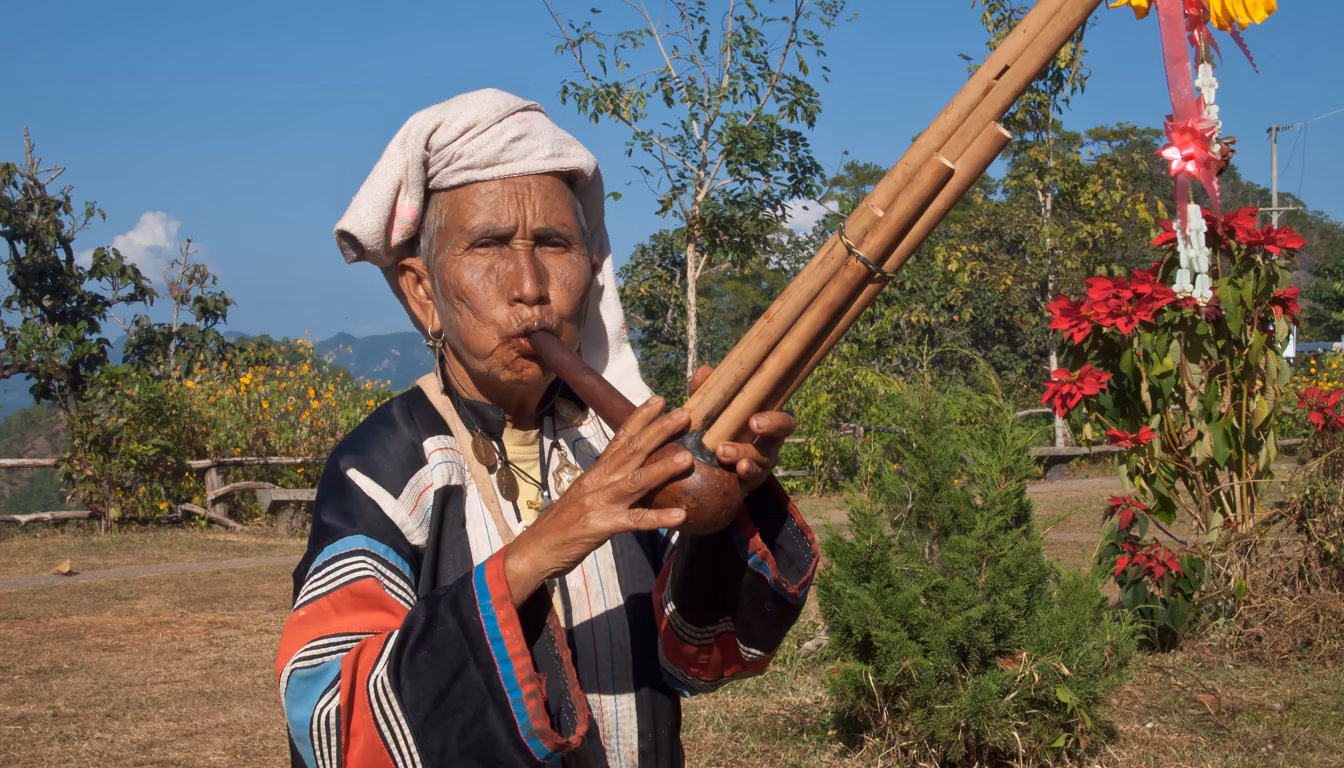 Kayan long neck village woman in Pai Mae Hong Son wearing traditional brass neck coils