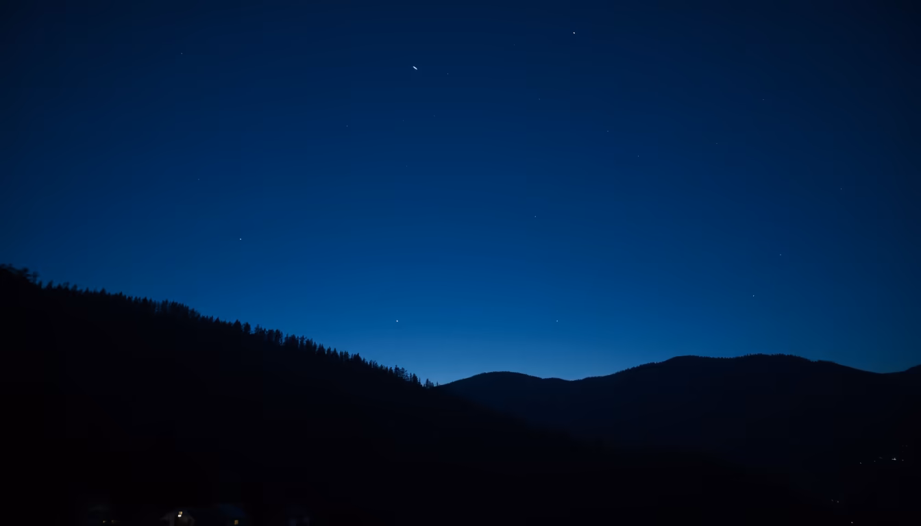 A clear cold night sky over hills before a sea-of-fog Pai viewpoints morning (illustration)