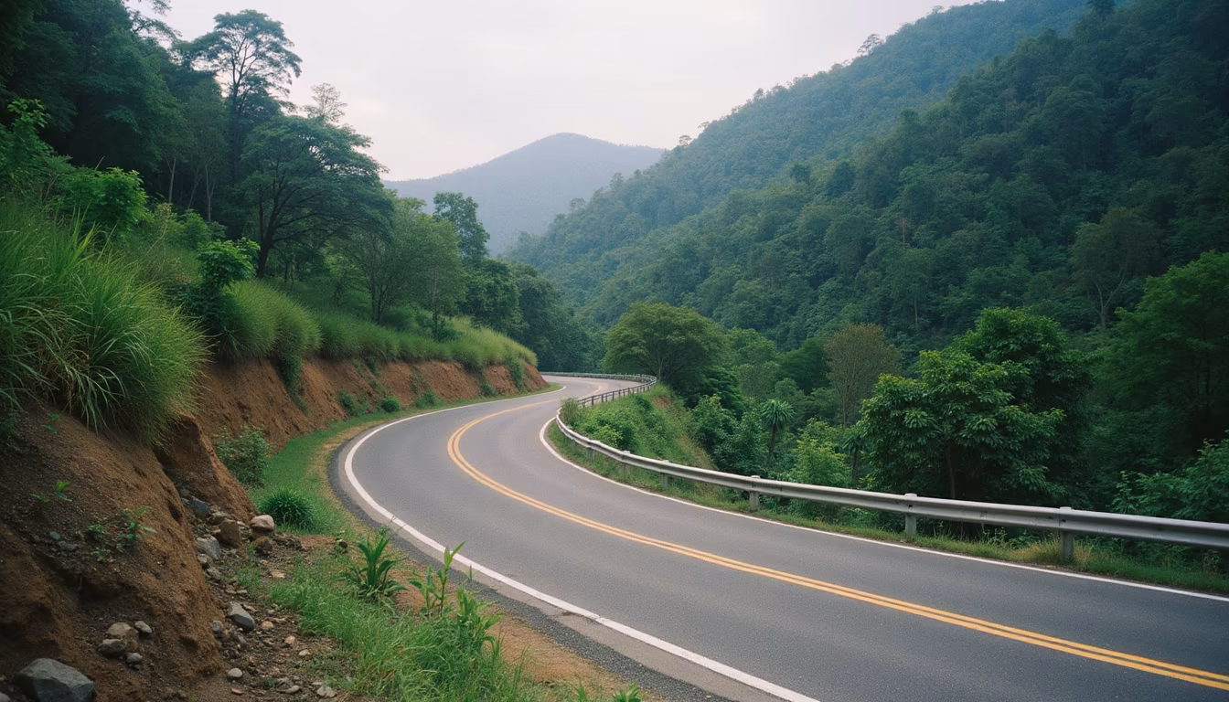 Highway 1095 mountain road to Pai winding through forested hills in northern Thailand (illustration)