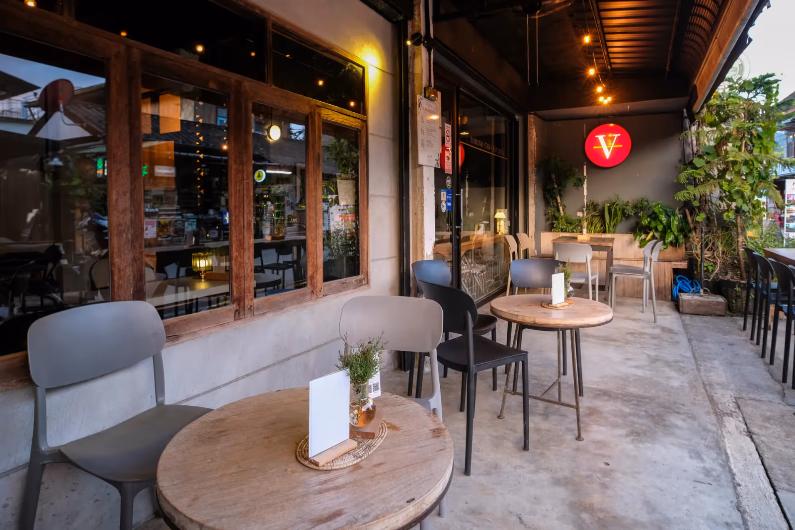 The side terrace of Vermut Café under the red V sign, 35/1 Pai Walking Street